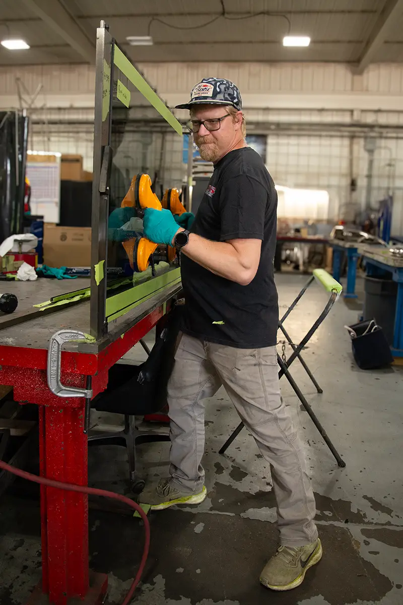 DTS Employee Nate Moving Glass Component