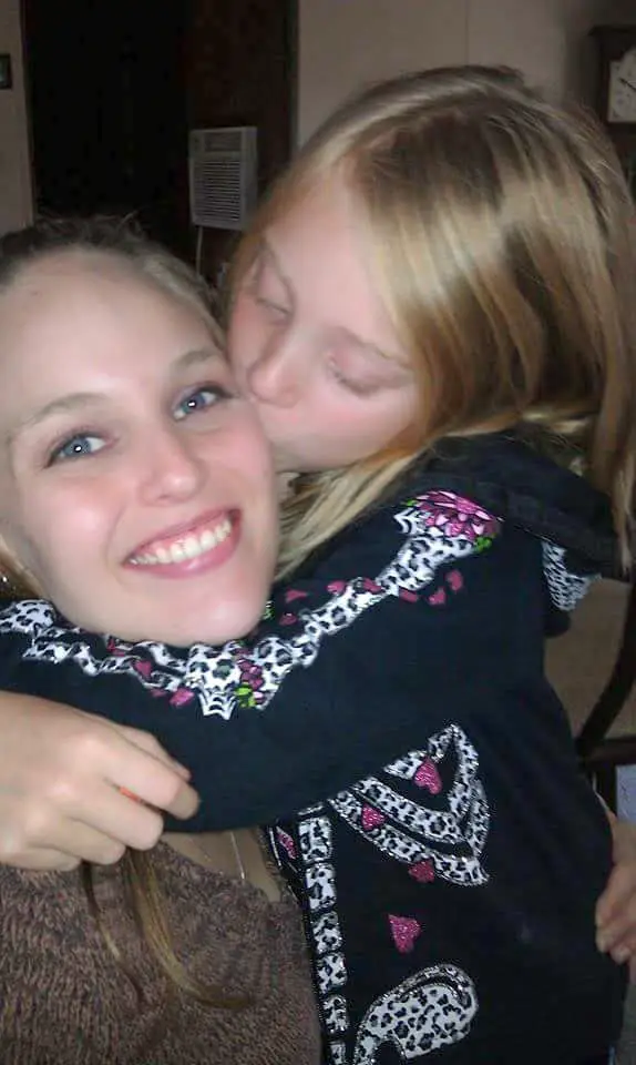 DTS Employee Heather Hugging Daughter